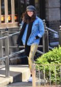 Shailene Woodley sports a denim jacket with a plaid yellow pants as she steps out in New York City