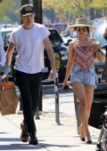 Vanessa Hudgens takes on LA heat donning chic bandana top during lunch outing with boyfriend Austin Butler in Los Angeles