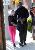 Ariel Winter sports hot pink leggings and a sheer top for a trip to the  studio
