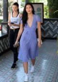 Cindy Kimberly smiles for the cameras following lunch with friends on the Sunset Strip at Tocaya in West Hollywood, Los Angeles
