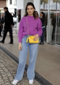 Emma Mackey spotted in a pink jumper and blue jeans outside the Hotel Martinez in Cannes, France
