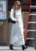 Emma Roberts steps out in a white maxi dress for some grocery shopping in Los Angeles