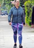 Kelly Brook sports a hoodie and colorful leggings while out for a walk with Jeremy Parisi in London, UK