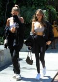Madison Beer shows off her toned body in a sports bra and leggings