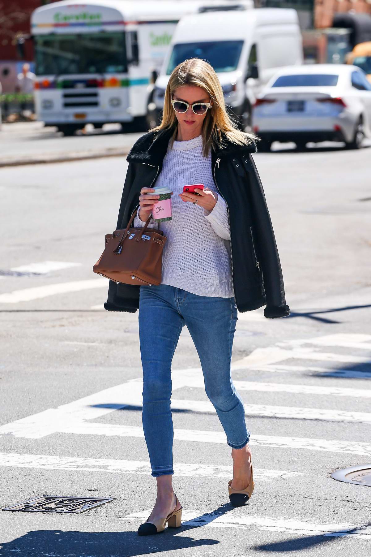nicky hilton looks stylish in a black jacket, white sweater and skinny ...