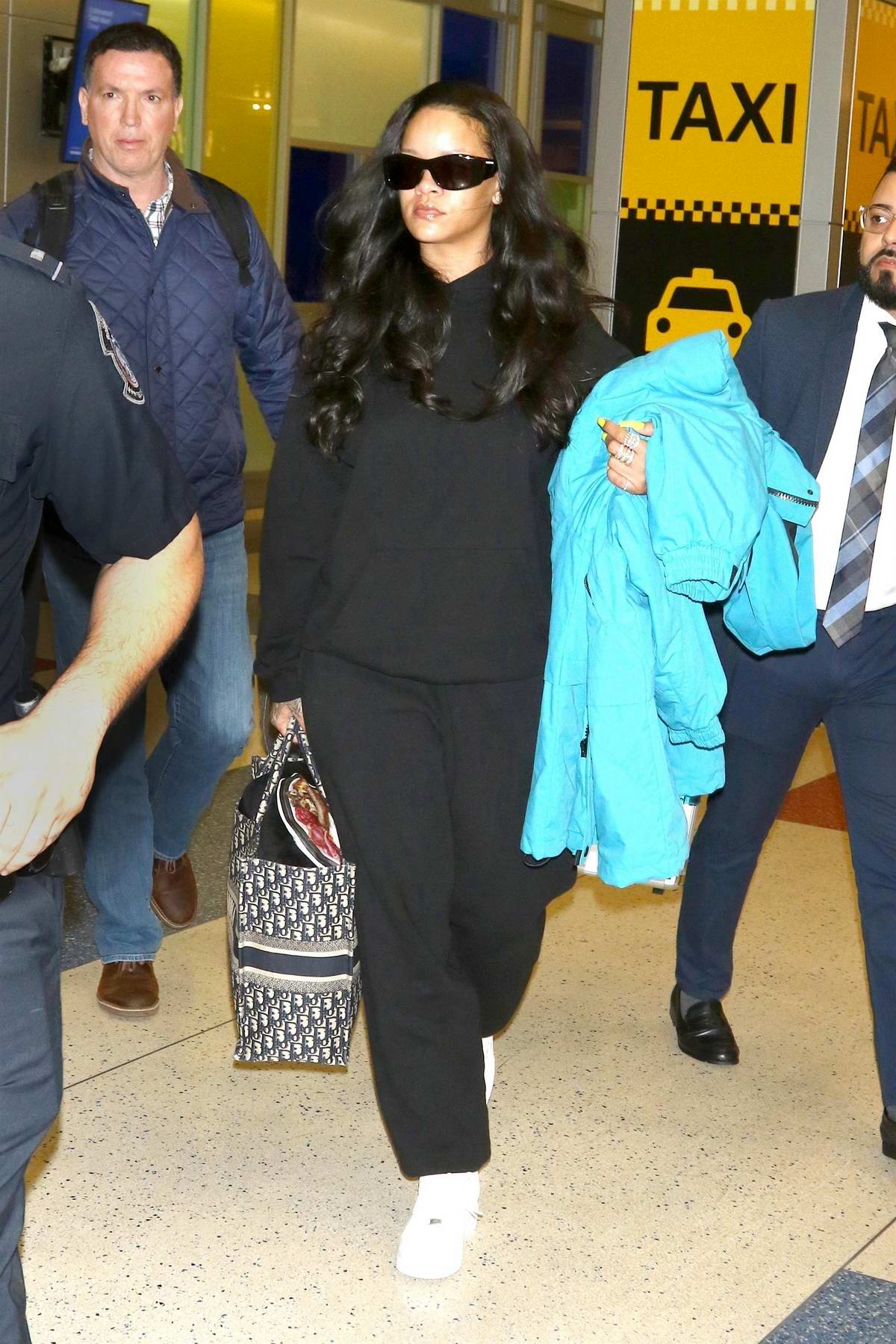 Rihanna's Fashion — Arriving at JFK airport, New York City, NY
