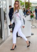 Doutzen Kroes is all smiles as she arrives at the Martinez hotel during the 72nd annual Cannes Film Festival in Cannes, France