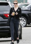 emma roberts wears a knitted yellow cardigan and denim shorts during a  shopping trip to louis vuitton in los angeles-080719_9