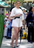 Hilary Duff flaunts her legs in a white romper while on the set of 'Younger' in New York City