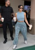 Kim Kardashian grabs a couple of milkshakes from BurgerIM in Calabasas, California