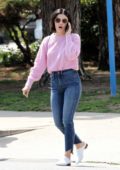 Lucy Hale looks pretty in a pink sweater and jeans as she stops by for a coffee in Studio City, Los Angeles