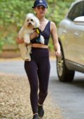 Lucy Hale wears cropped tank top and leggings as she takes her dog out for hike in Los Angeles