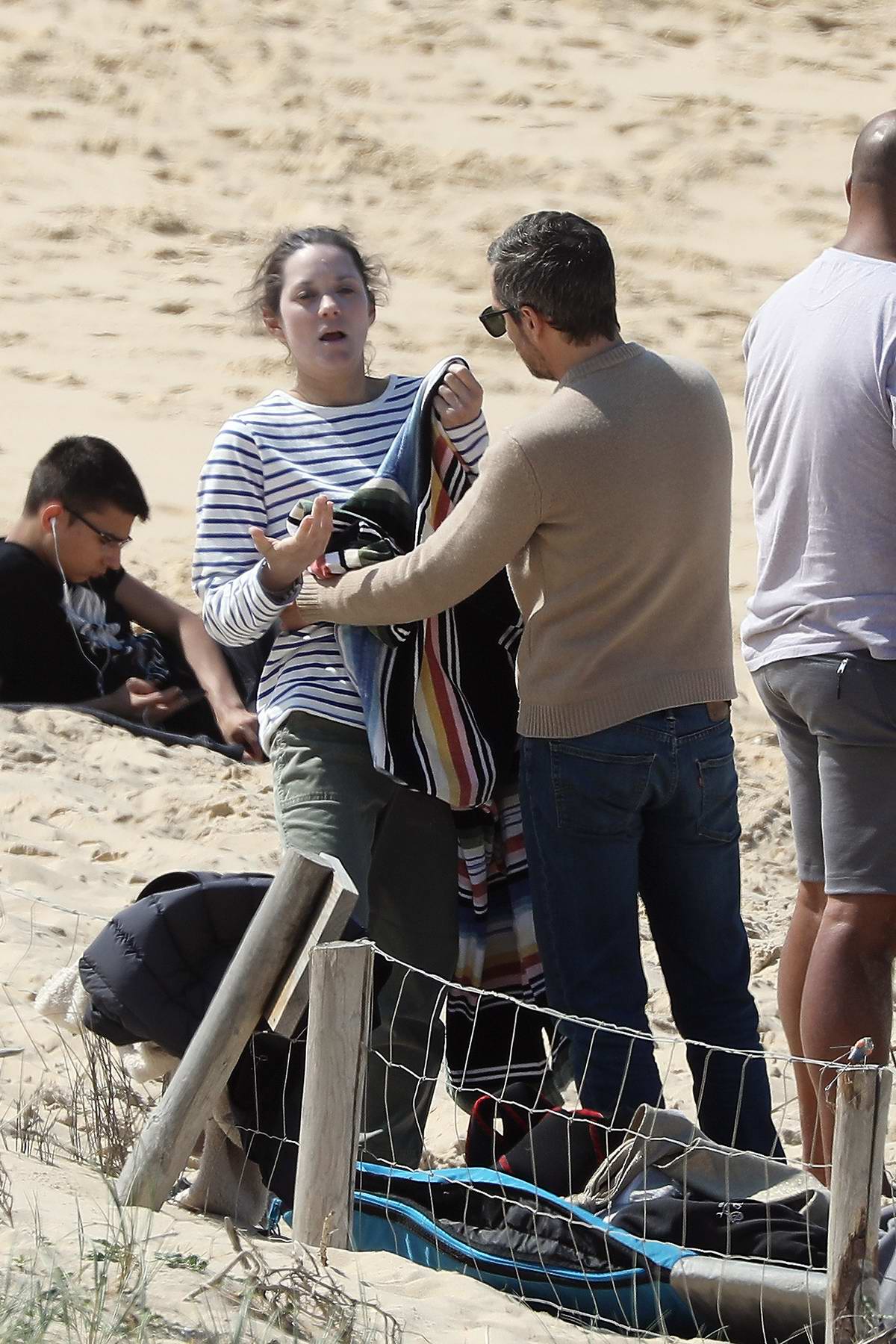 Marion Cotillard Gets Help From Husband Guillaume Canet To Put On A Wetsuit As She Hits The Wave