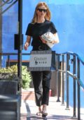 Rosie Huntington-Whiteley looks chic while out shopping at Couture Kids in West Hollywood, Los Angeles