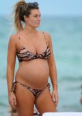 Samantha Hoopes shows off her baby bump in an animal print bikini while enjoying the sun in Miami, Florida