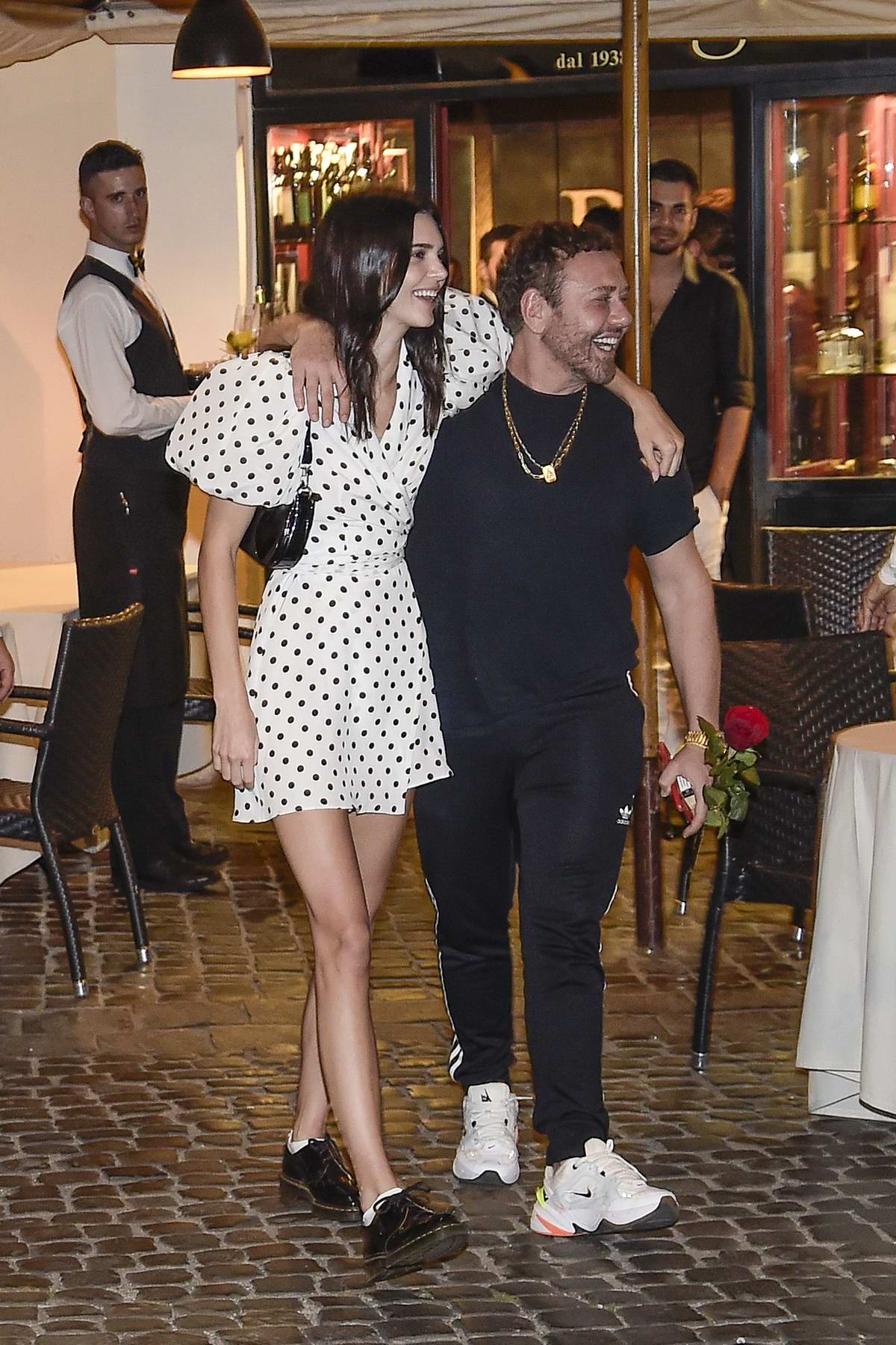 Kendall Jenner in white polka dot mini dress and black patent shoes in Rome  on June 4 ~ I want her style - What celebrities wore and where to buy it.  Celebrity Style
