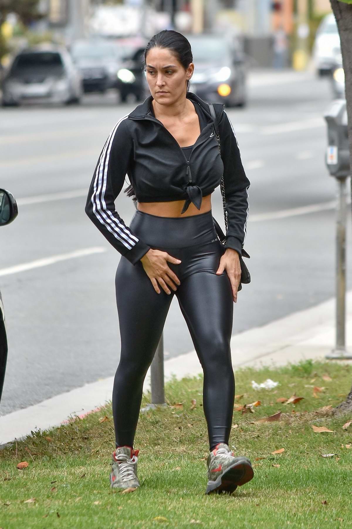 nikki bella shows off her fit physique in black athleisure