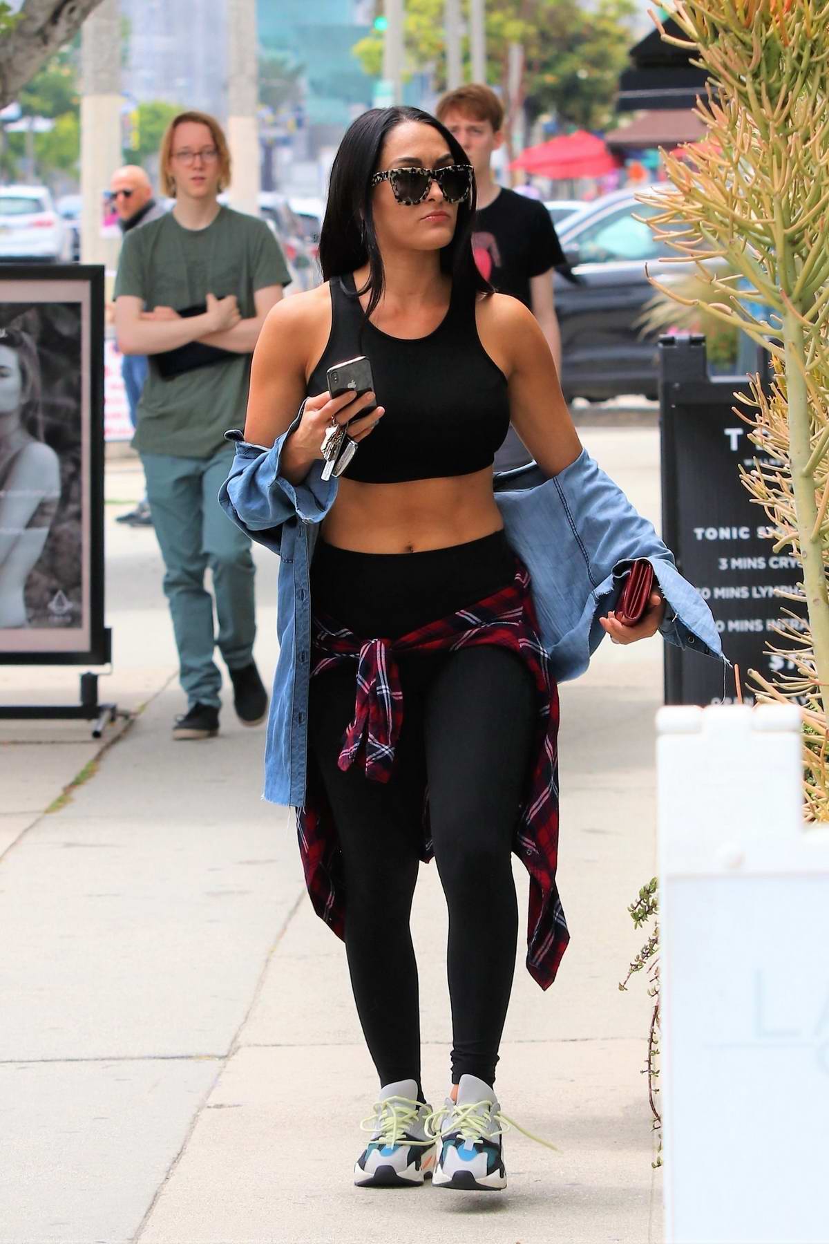 Nikki Bella's Black Crop Top & Leggings While Shopping In LA