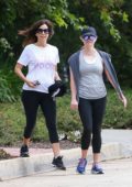 Reese Witherspoon heads for a workout with a friend in Los Angeles