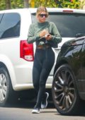 Sofia Richie bares her midriff in crop top and leggings as she leaves a friend's house in Los Angeles