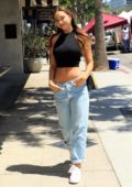 Alexis Ren shows off her toned midriff as she stepped out for an iced coffee at Alfred's in Studio City, Los Angeles