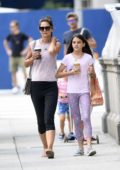 Katie Holmes and Suri Cruise are all smiles as they step out for stroll in  New York City