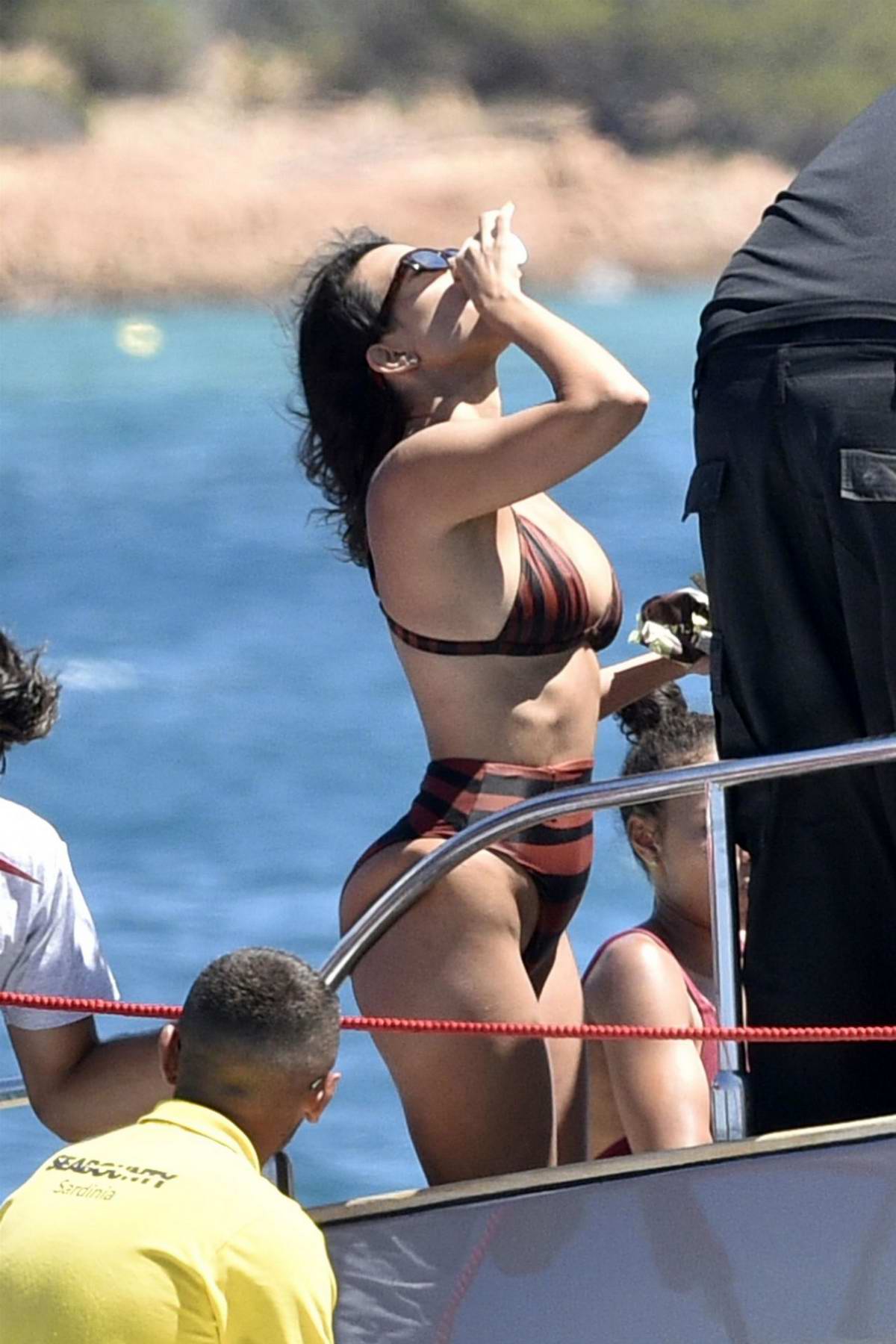 kourtney kardashian spotted in a bikini while enjoying an ice cream on a  yacht in sardinia, italy-300719_2