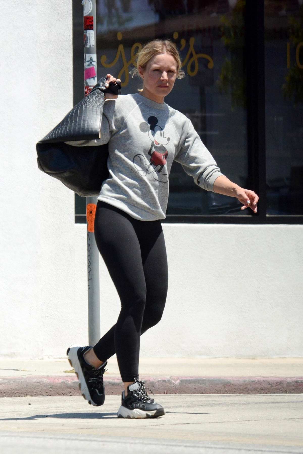 Kristen Bell wears a 'Mickey Mouse' sweatshirt and leggings as she heads to  the gym in