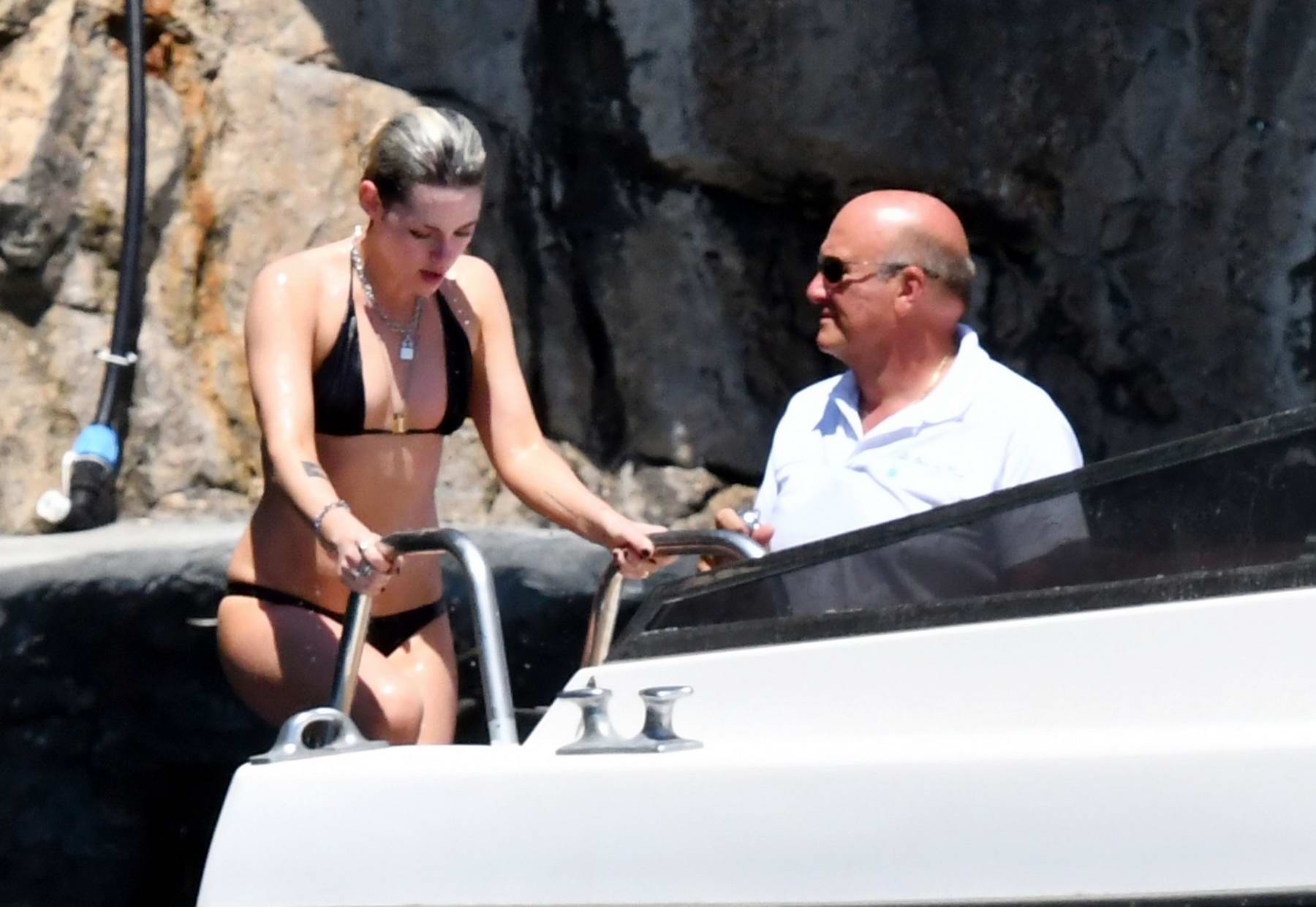 Kristen Stewart Spotted In A Black Bikini While Relaxing On A Yacht With Stella Maxwell In