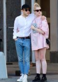 Lucy Boynton and Rami Malek enjoy a sweet cuddle during cozy grocery run in Manhattan, New York City