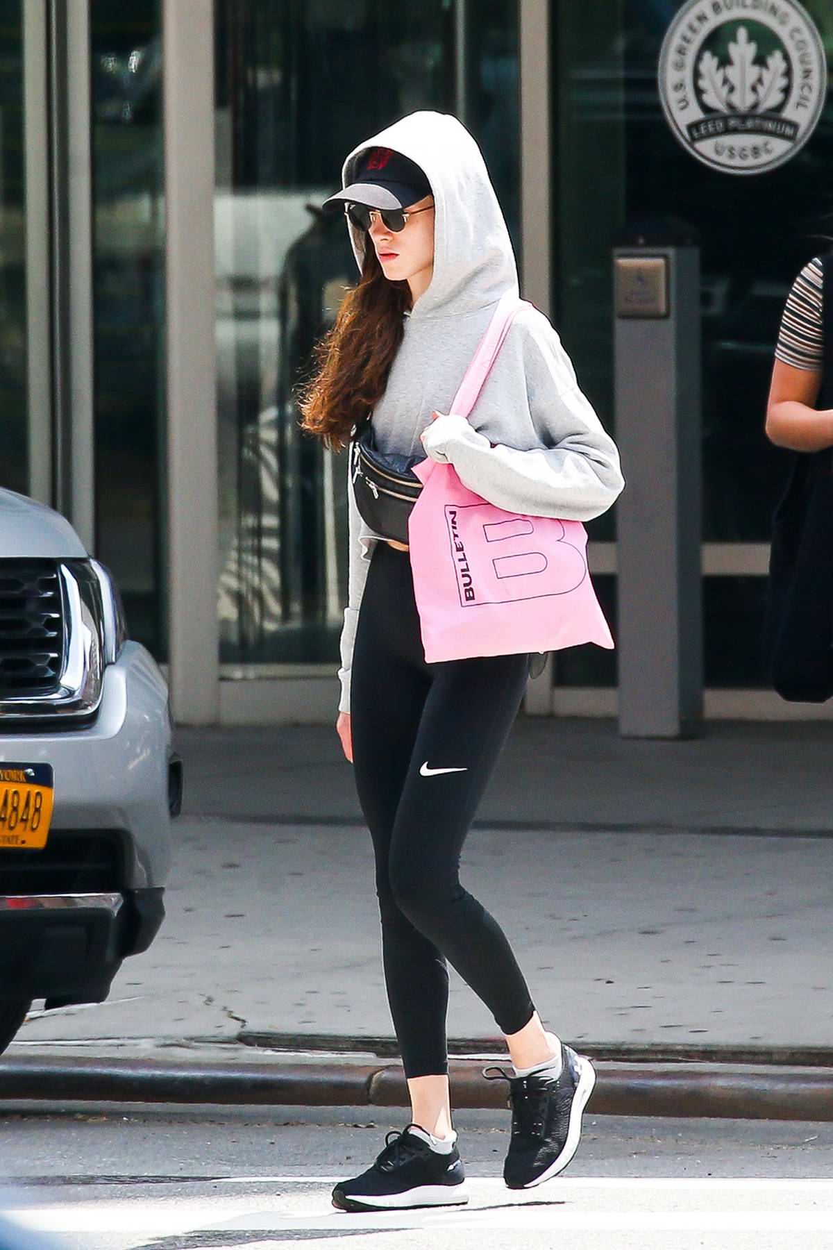 Natalia Dyer Goes Incognito In A Hat And Hoodie Paired With Leggings While Out In New York City