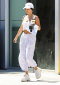 Vanessa Hudgens dons all white as she stop by a gas station to fuel up her car in Los Angeles