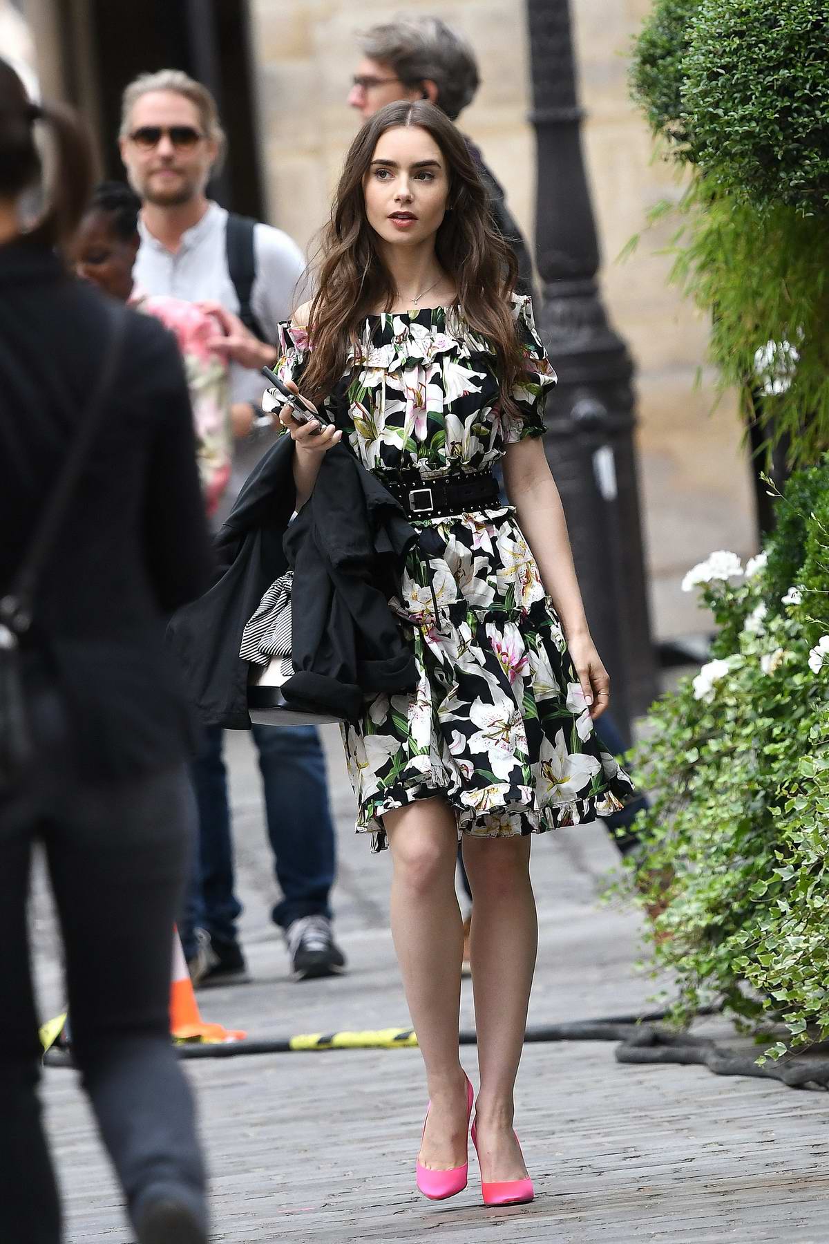 lily collins looks pretty in a floral dress while filming 'emily in ...