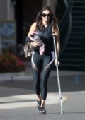 Nina Dobrev seen leaving a Pilates class on a crutch in West Hollywood, Los Angeles