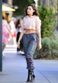Olivia Culpo looks striking in stylish pants paired with a crop top while out in Los Angeles