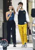 Dua Lipa and Anwar Hadid give photographer the finger after buying ice cream at Kith store in SoHo New York City