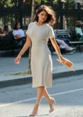 Eiza Gonzalez twirls a hat during a casual photoshoot on the streets of SoHo in New York City