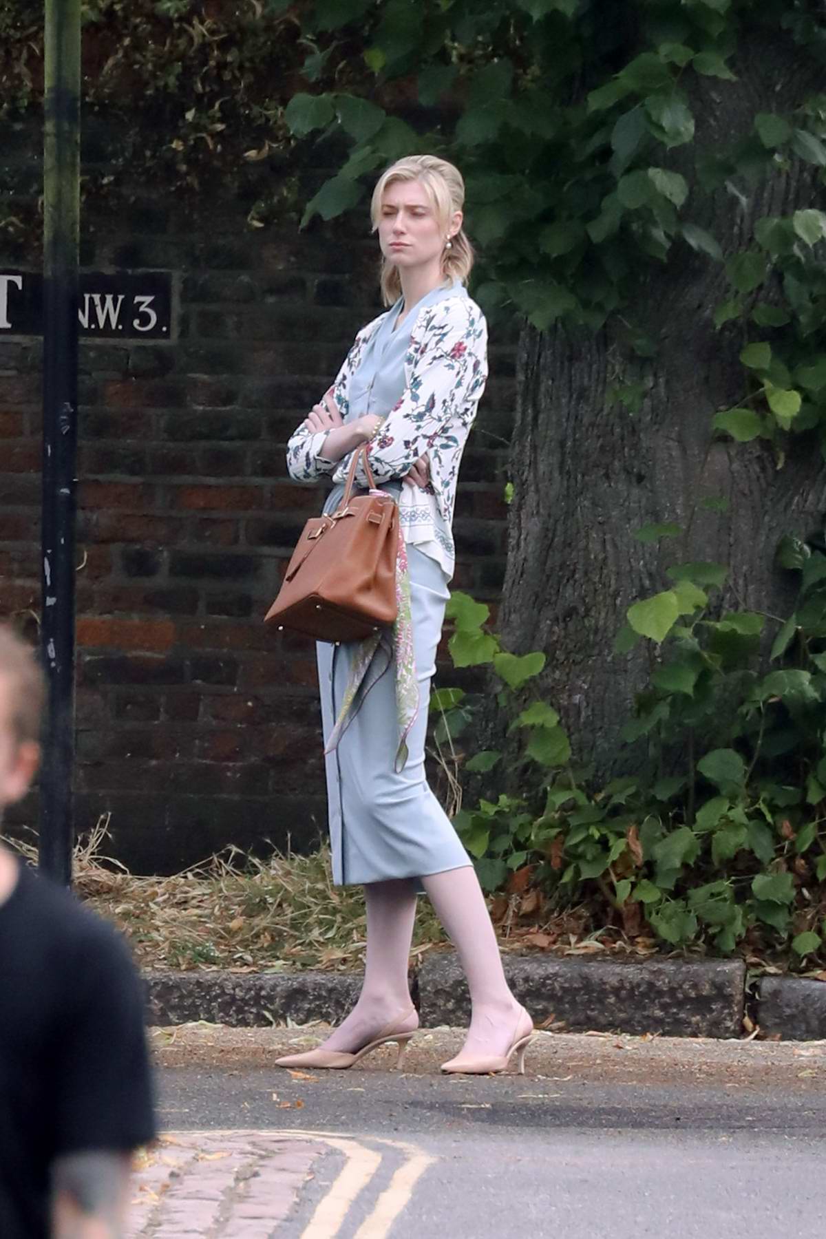 Karlie Kloss looks striking in pink pantsuit while heading out in New York  City