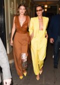 Gigi and Bella Hadid attend 'The Americans in Paris' event during Paris Fashion Week in Paris, France