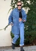 Hailey Baldwin flaunts her abs in a black crop top paired with double denim as she steps out in Beverly Hills, Los Angeles