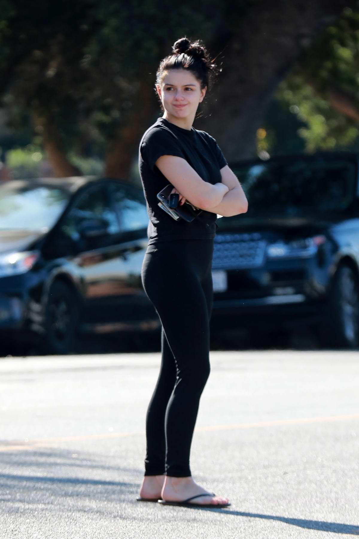 Ariel Winter keeps it casual in a black tee and leggings while