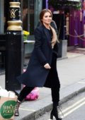 Cheryl Tweedy looks chic in all-black while out around the Soho area of Central London, UK