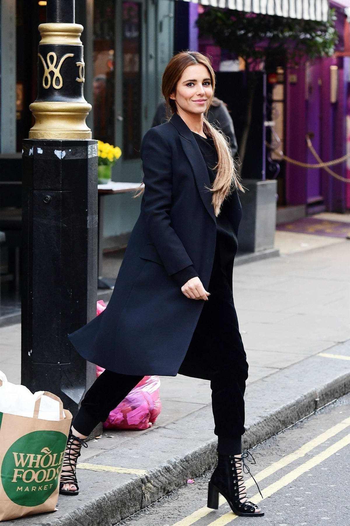 Cheryl Tweedy looks chic in all-black while out around the Soho area of Central London, UK