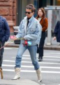 Emily Ratajkowski rocks double denim while out for a stroll with her dog in New York City