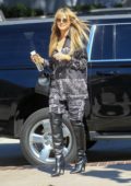 Heidi Klum dons a stylish patterned ensemble as she arrives at America's Got Talent Finals in Pasadena, California