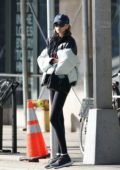 Kaia Gerber spotted in a puffer jacket, leggings and Adidas trainers as she leaves the gym in New York City