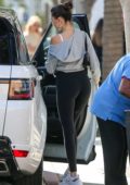 Francia Raisa wears a strapless top and jeans while out for lunch with  friends in West