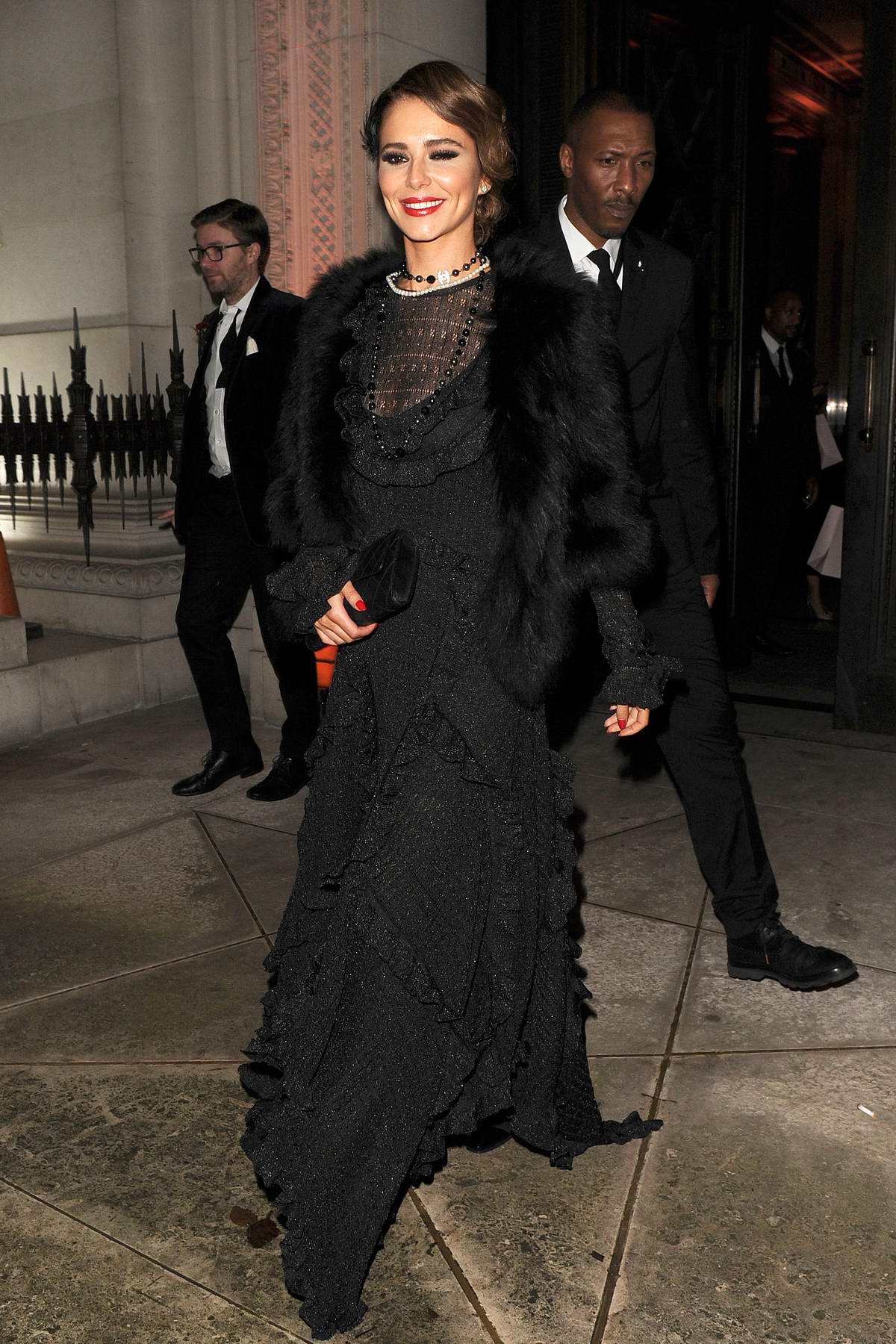 Cheryl Tweedy looks great in a vintage black lace dress while leaving the Freemasons Hall in Covent Garden, London, UK