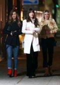 Dakota Johnson looks amazing in a white coat while enjoying a girls night out in Los Feliz, California