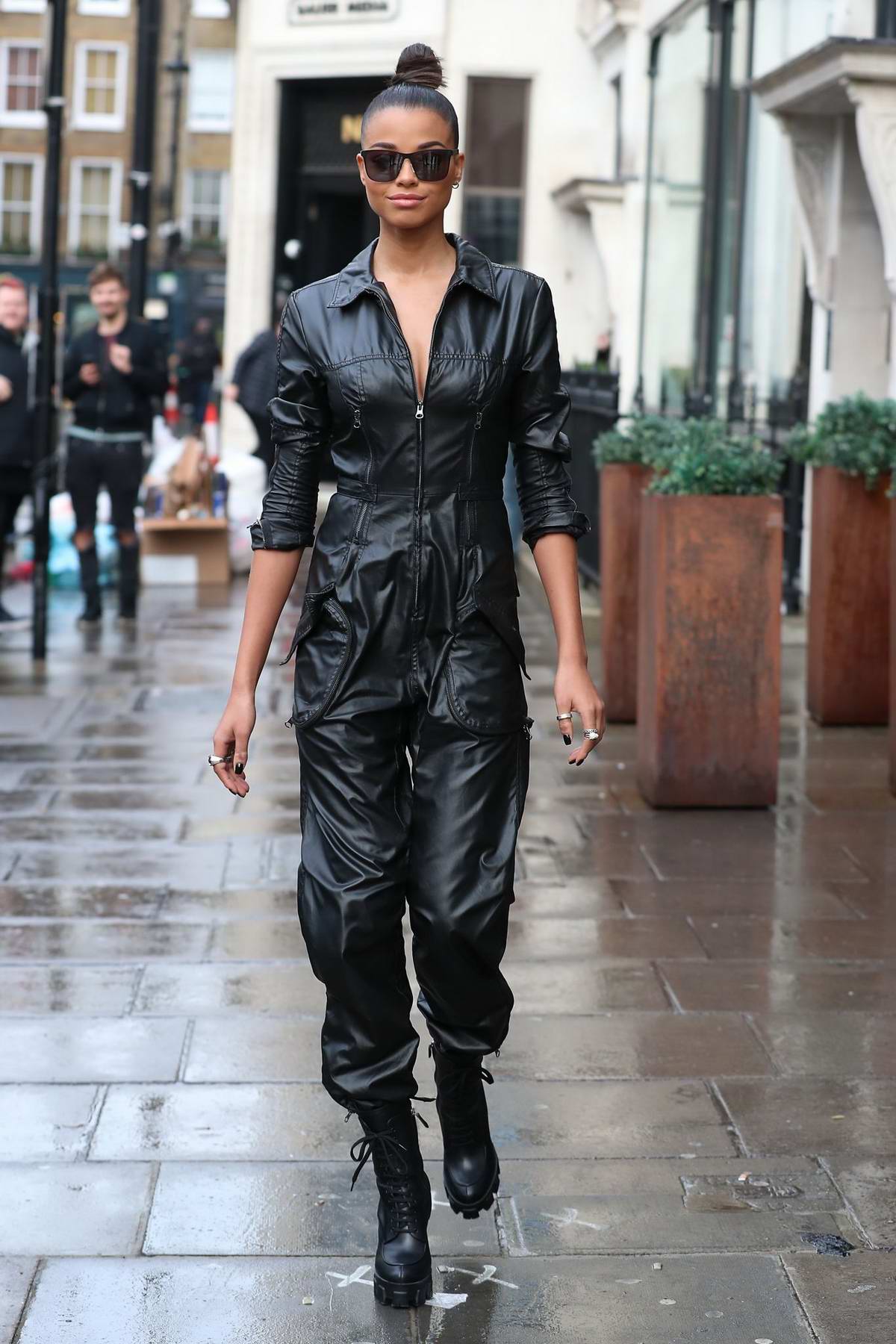https://www.celebsfirst.com/wp-content/uploads/2019/11/ella-balinska-looks-stylish-in-a-black-leather-jumpsuit-as-she-visits-kiss-fm-radio-studios-in-london-uk-221119_7.jpg